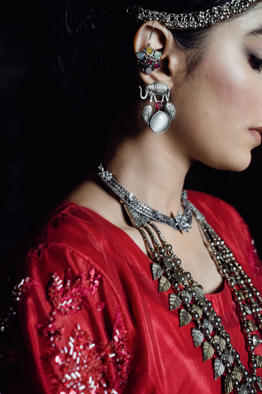 Embark on a mesmerizing voyage through time with the “Qasar-e-Noor Collection ’24.” This collection seamlessly fuses the opulent allure of the Mughal era with a contemporary twist, presenting creations that epitomize both enduring classicism and modern sophistication. With utmost precision and care, each piece encapsulates a narrative steeped in rich heritage, resonating with the lavish opulence that once graced the illustrious courts of ancient India. Immerse yourself in this enchanting fusion of history and refinement, where every jewel narrates a tale of unparalleled beauty and artistry.
